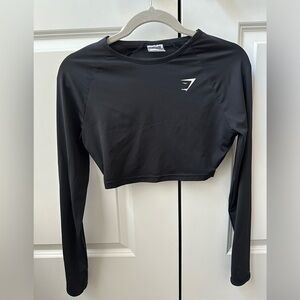 Gymshark long sleeve crop top. Light, stretchy, xs, thumb holes, vented back.
